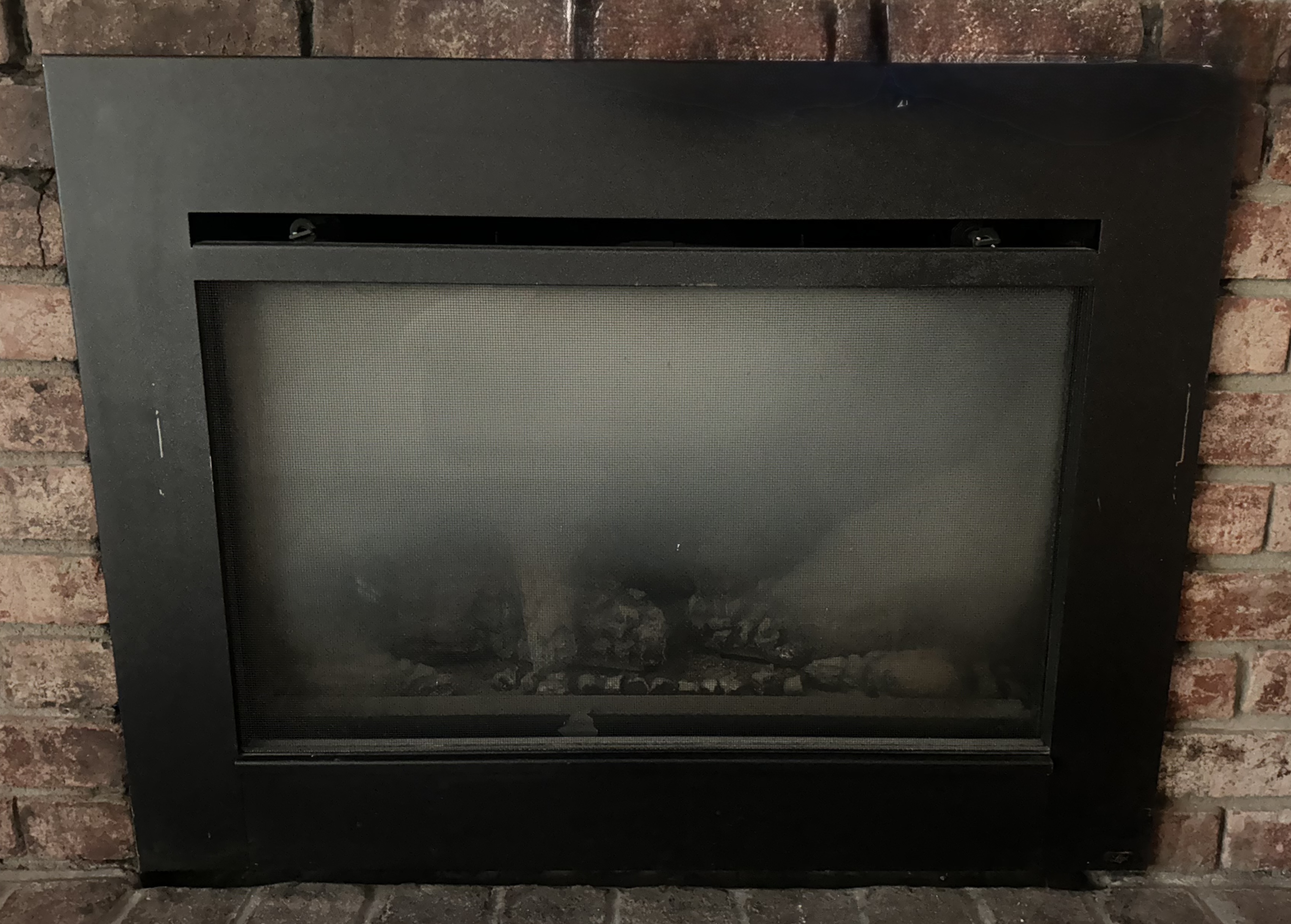 Gas fireplace before cleaning