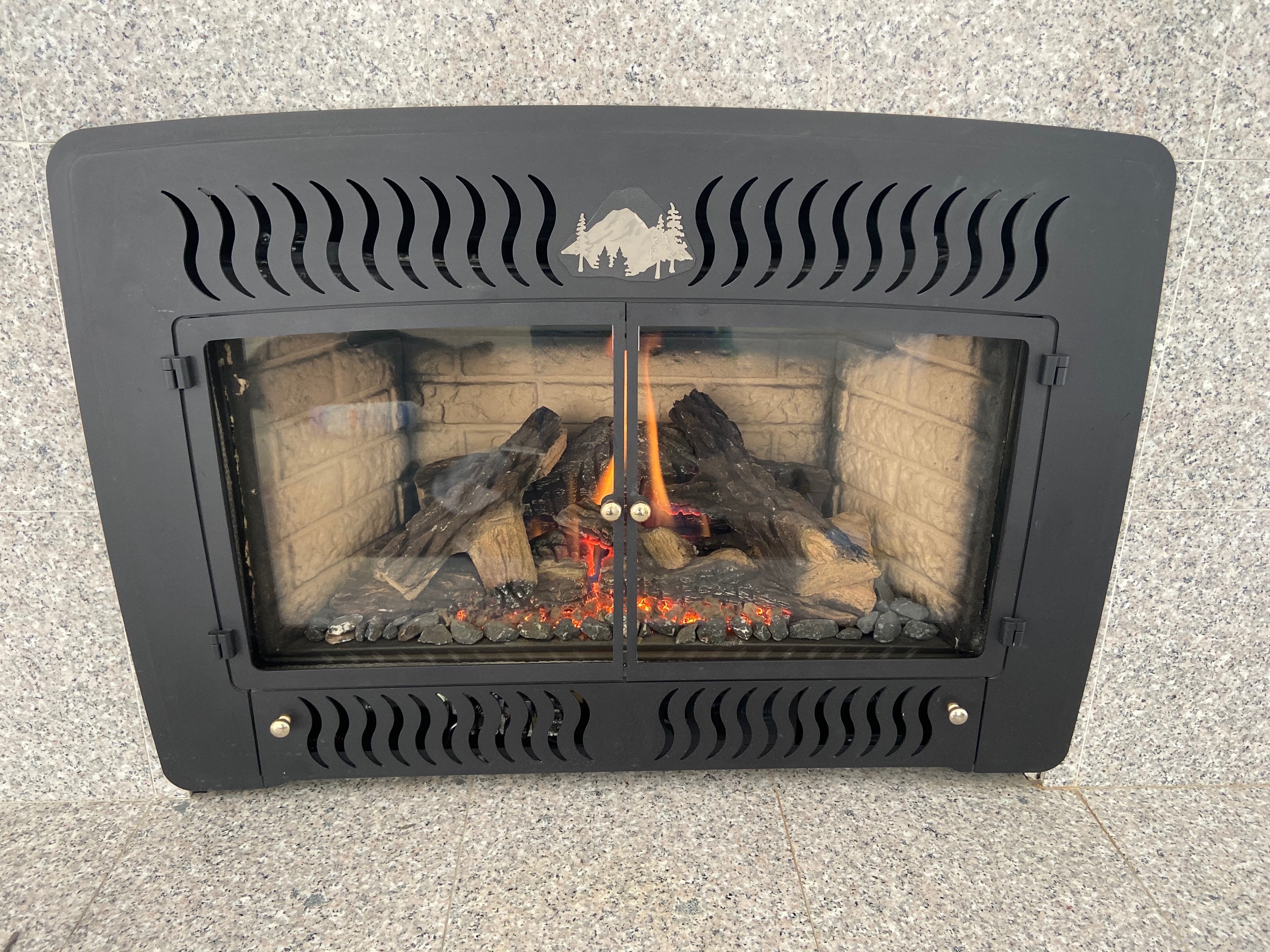 Gas fireplace before cleaning