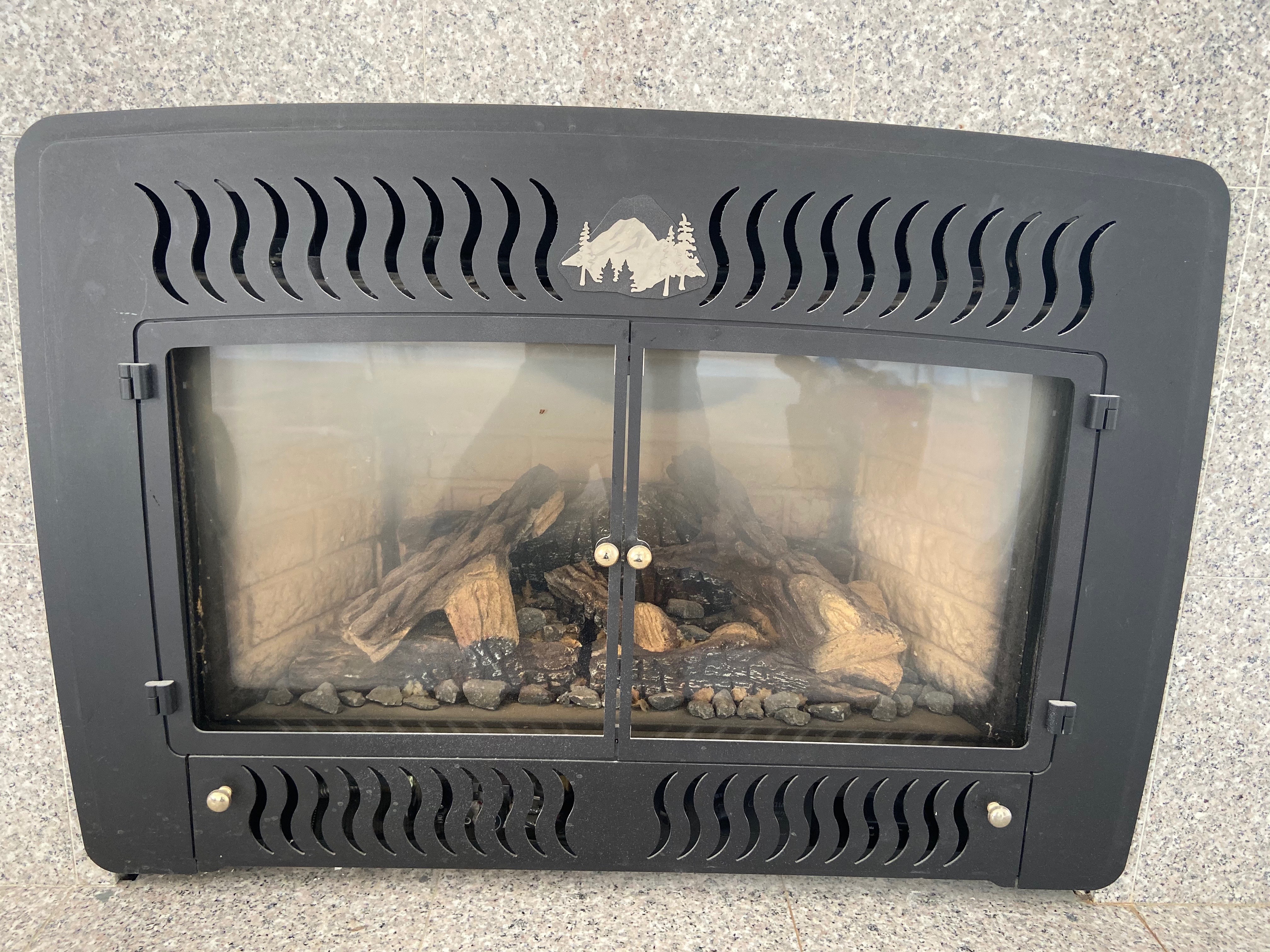 Gas fireplace before cleaning